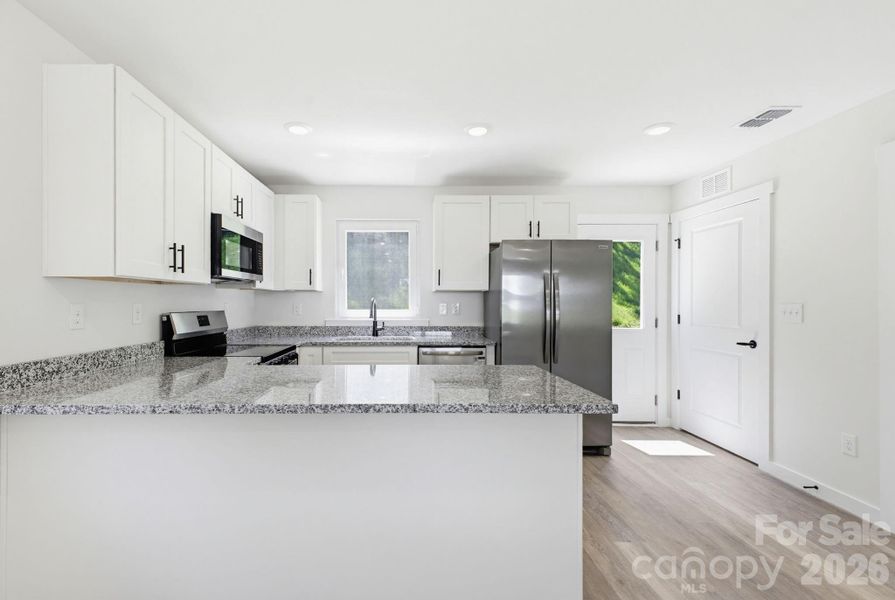 Furnished interior view inside a new home in , Conover (Image 4).