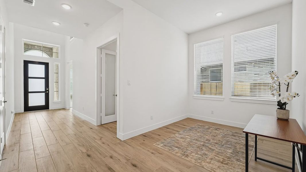 Representative unfurnished interior of a home built from the Cayman by Chesmar Homes in Crescent Bluff, Georgetown (Image 23).