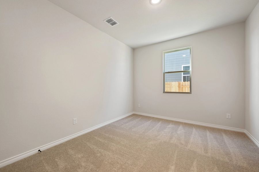 Spacious, unfurnished interior of a new home in The Homestead at Lariat, Liberty Hill (Image 26).