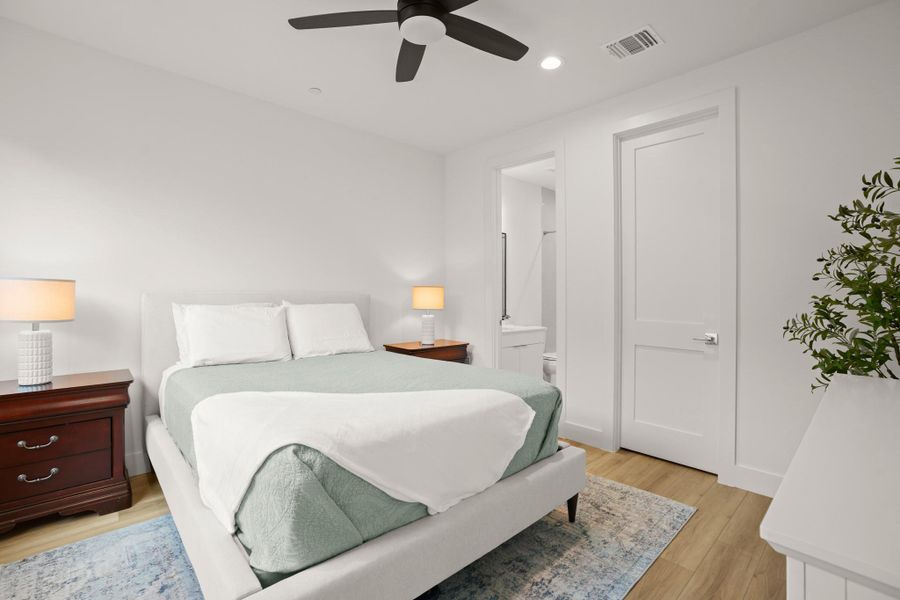 One of three secondary bedrooms upstairs, this bedroom serves as a junior suite with a walk-in closet and private ensuite bathroom. One of three secondary bedrooms upstairs, this bedroom serves as a junior suite with a walk-in closet and private ensuite bathroom.