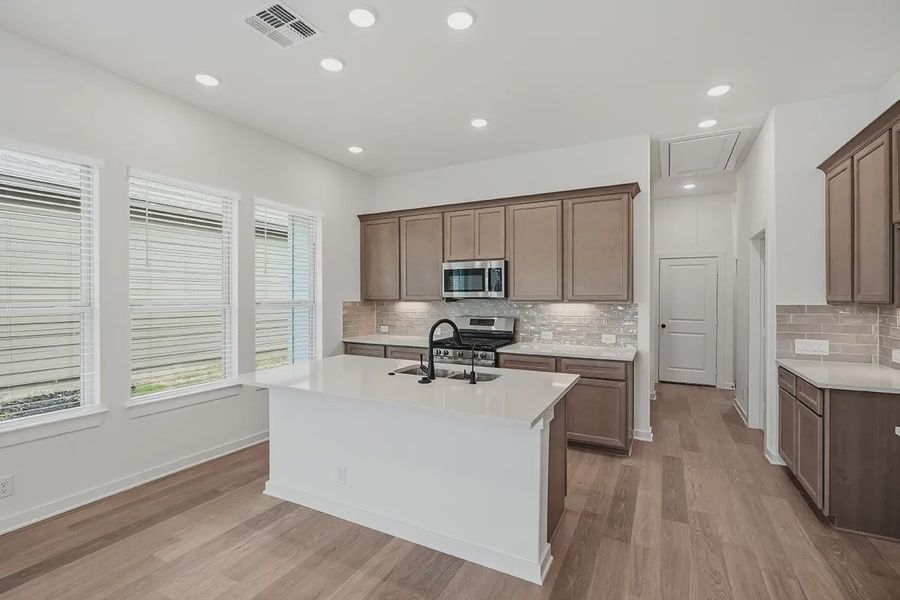 Furnished interior view inside a new home in The Crossvine, Schertz (Image 8).