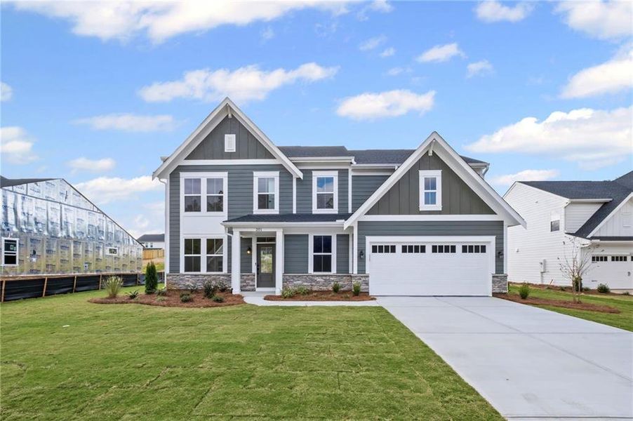 Front exterior of a new home in Pickens Bluff, Hiram, GA, highlighting curb appeal (Image 2).