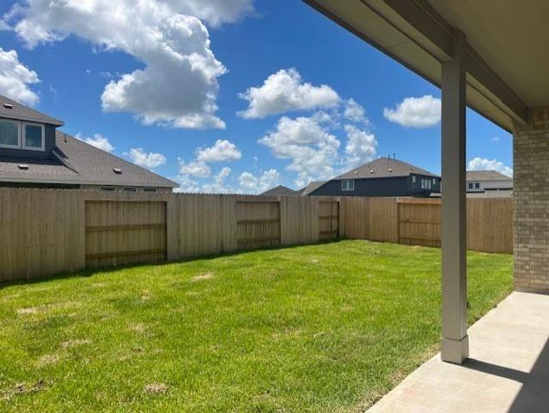 Exterior details and patio area of a home in Lago Mar: Fairway Collections, Texas City (Image 3).