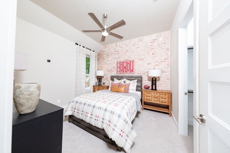 Furnished interior view inside a new home in Ellwood: Prestige Collection, Iowa Colony (Image 13).