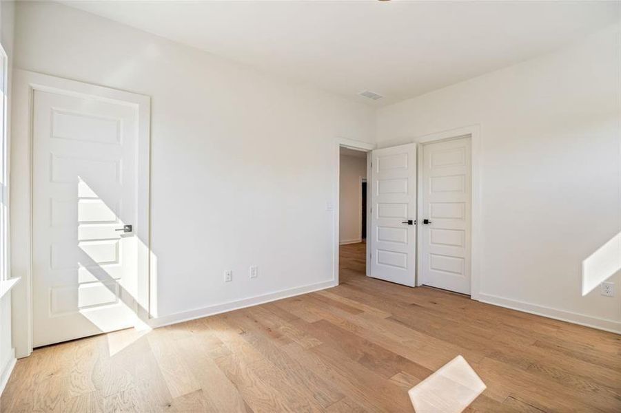 Spacious, unfurnished interior of a new home in Long Hollow Landing, Gainesville (Image 42).