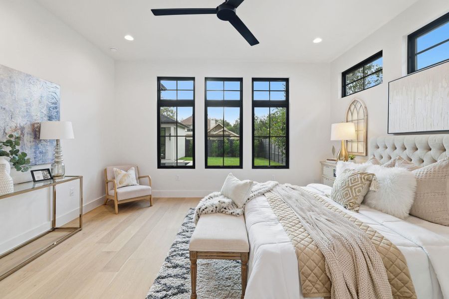 Bedroom featuring light wood-style floors, recessed lighting, and ceiling fan