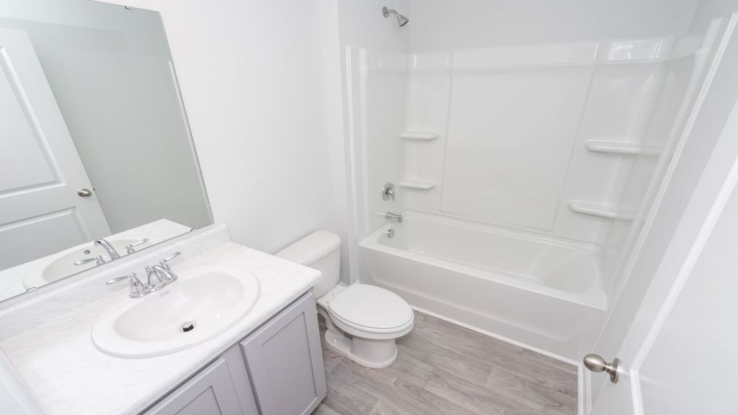 Representative furnished interior of a home built from the ARIA by D.R. Horton in Stanbury Creek, Supply (Image 3).