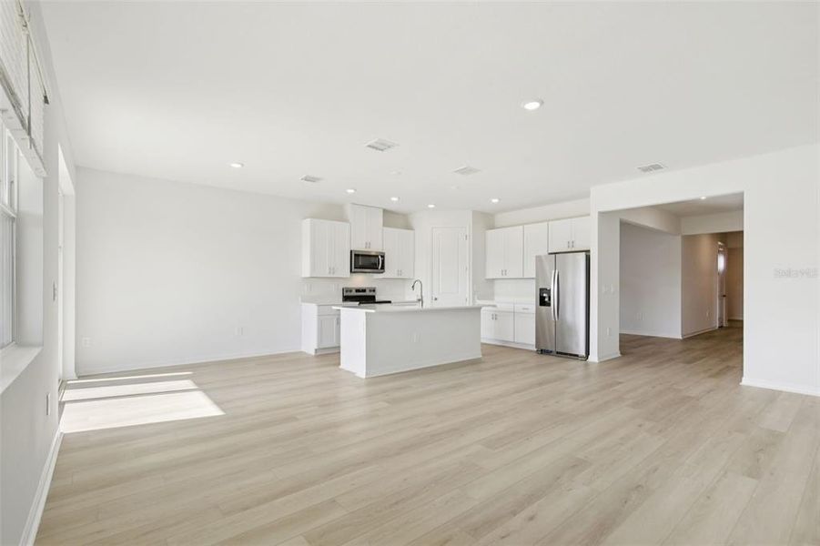 Spacious, unfurnished interior of a new home in Coasterra - Reserve Series, Palmetto (Image 28).