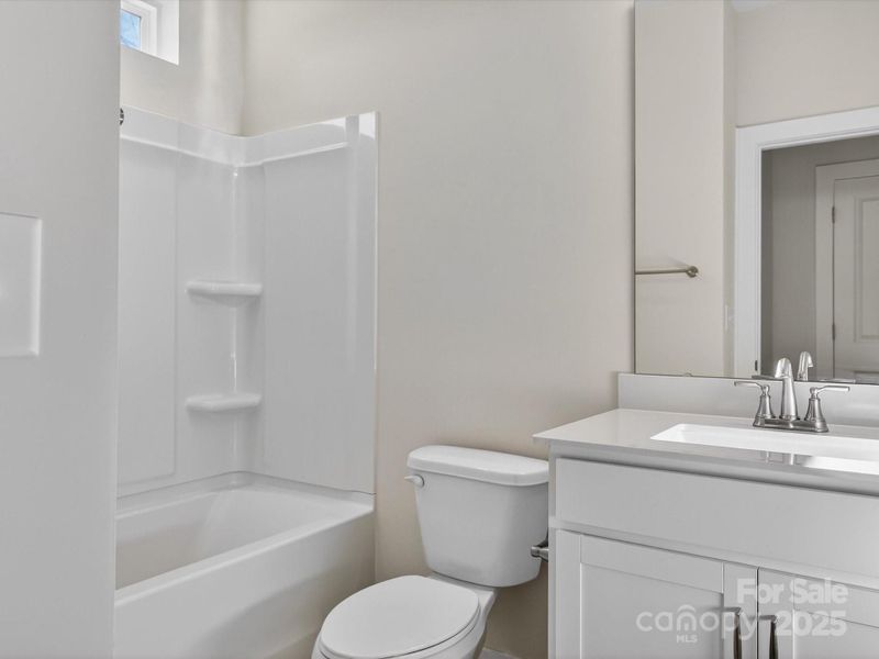 Furnished interior view inside a new home in Central Living at Craig, Charlotte (Image 10).