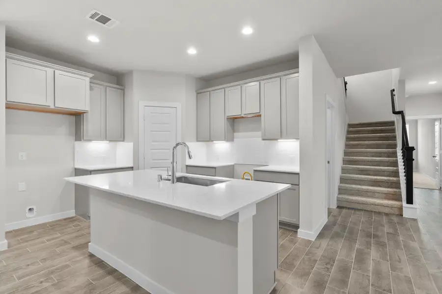 Furnished interior view inside a new home in Cypresswood Landing, Humble (Image 4).