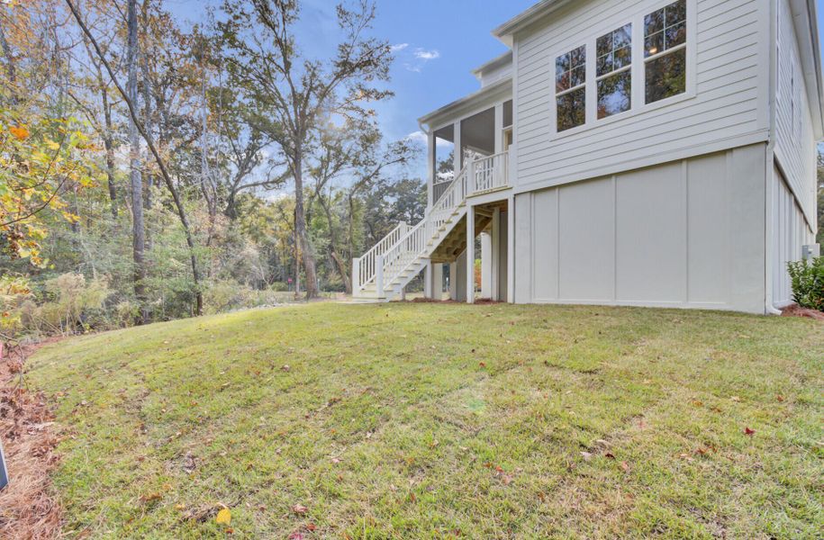 Exterior details and patio area of a home in Indigo Grove Single Family Homes, Johns Island (Image 28).