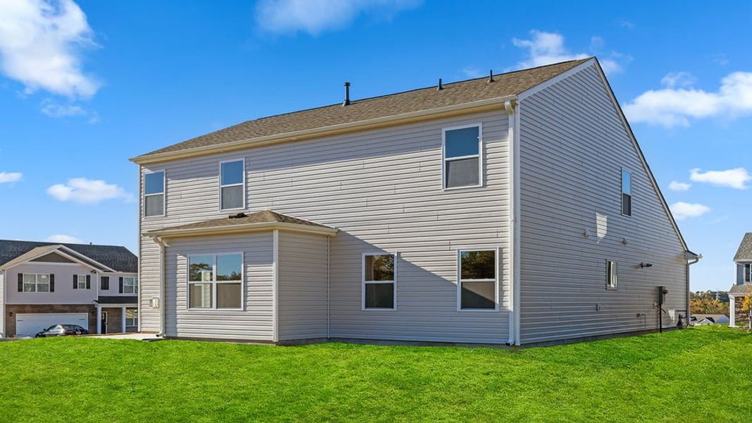 Exterior details and patio area of a home in Sherwood Gardens, Landrum (Image 22).