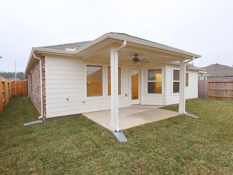 Exterior details and patio area of a home in Magnolia Ridge, Magnolia (Image 20).