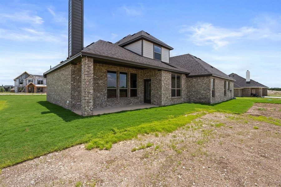Front exterior of a new home in , Waxahachie, TX, highlighting curb appeal (Image 23).