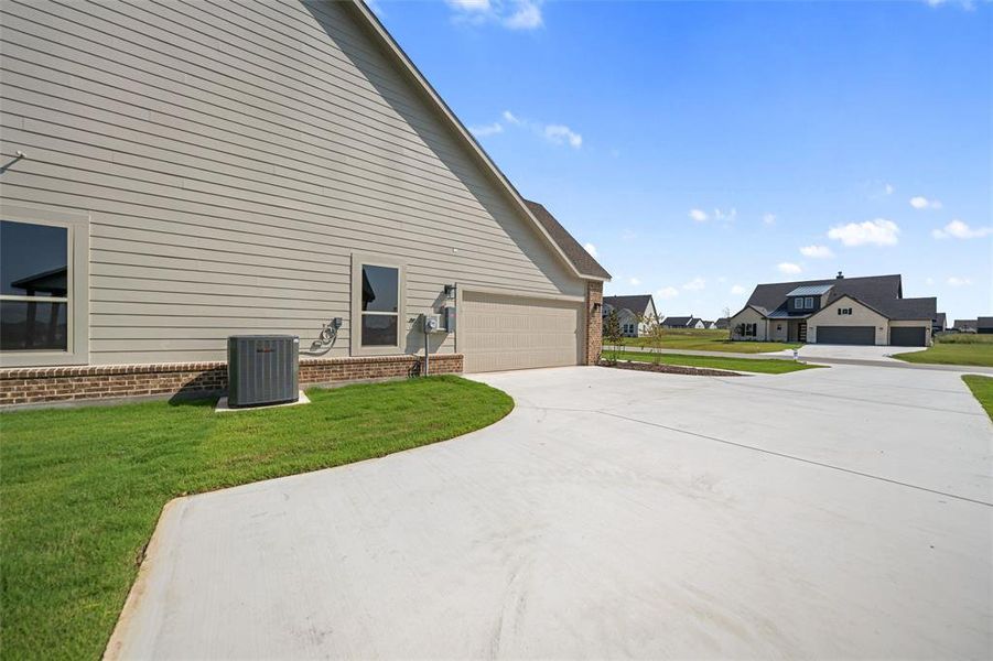 Front exterior of a new home in Fairview Meadows, New Fairview, TX, highlighting curb appeal (Image 20).