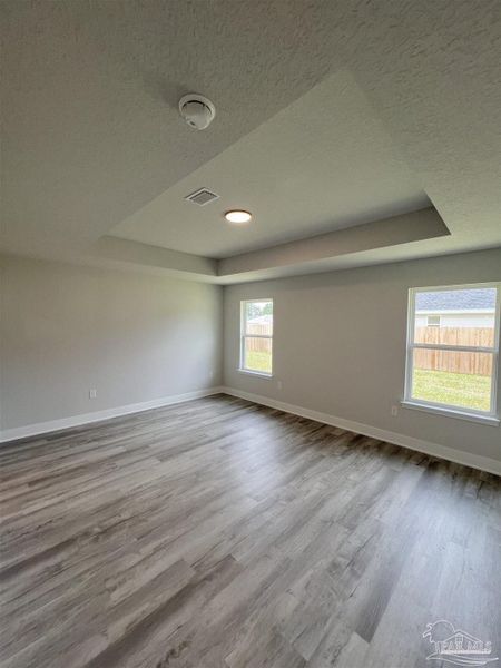 Spacious, unfurnished interior of a new home in Pine Top, Cantonment (Image 9).