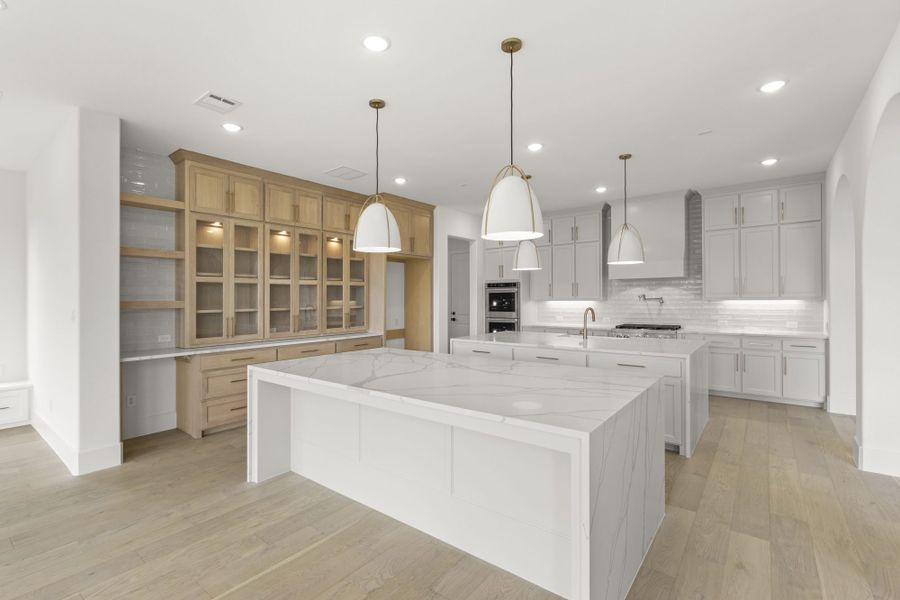 Representative furnished interior of a home built from the 7061 by Tradition Homes in Mustang Lakes, McKinney (Image 6).