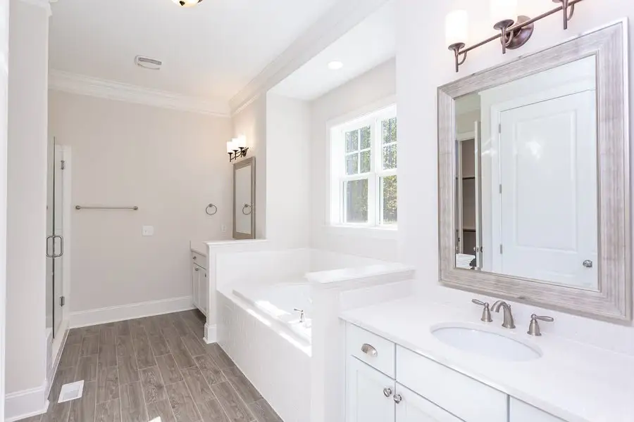 Representative furnished interior of a home built from the Charleston by Caruso Homes in Sauls Landing, Zebulon (Image 6).