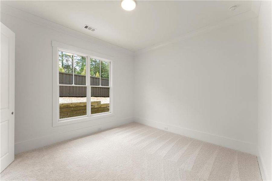Spacious, unfurnished interior of a new home in Woodford, Acworth (Image 22).