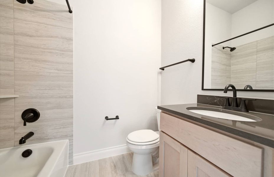 Furnished interior view inside a new home in Bridgeland 60′, Cypress (Image 30).