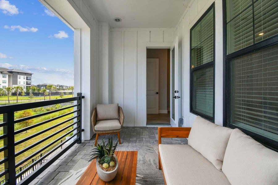 Representative exterior details of a home built from the The Rainwater by David Weekley Homes in Emerald Landing at Waterside at Lakewood Ranch – City Homes, Sarasota (Image 2).