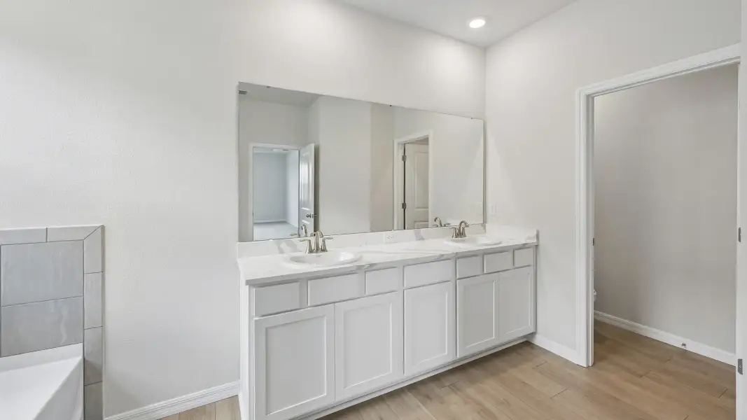 Furnished interior view inside a new home in Oakfield Trails, Parrish (Image 9).
