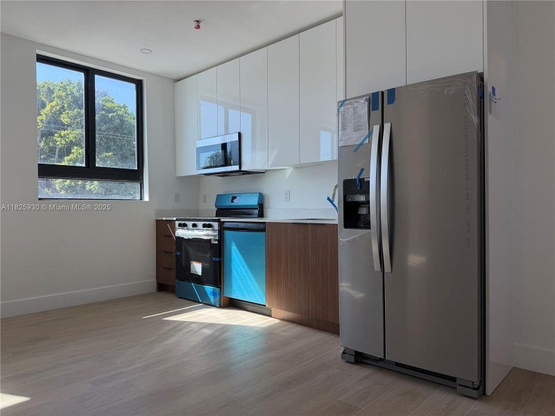 Furnished interior view inside a new home in , Miami (Image 19). Furnished interior view inside a new home in , Miami (Image 19).