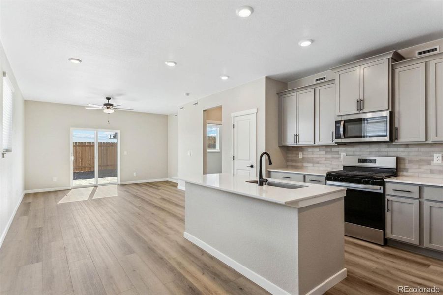 Furnished interior view inside a new home in Second Creek Farm, Commerce City (Image 5).