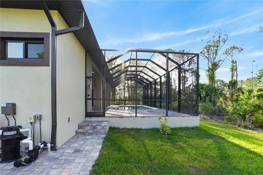 Exterior details and patio area of a home in , Port Charlotte (Image 47).