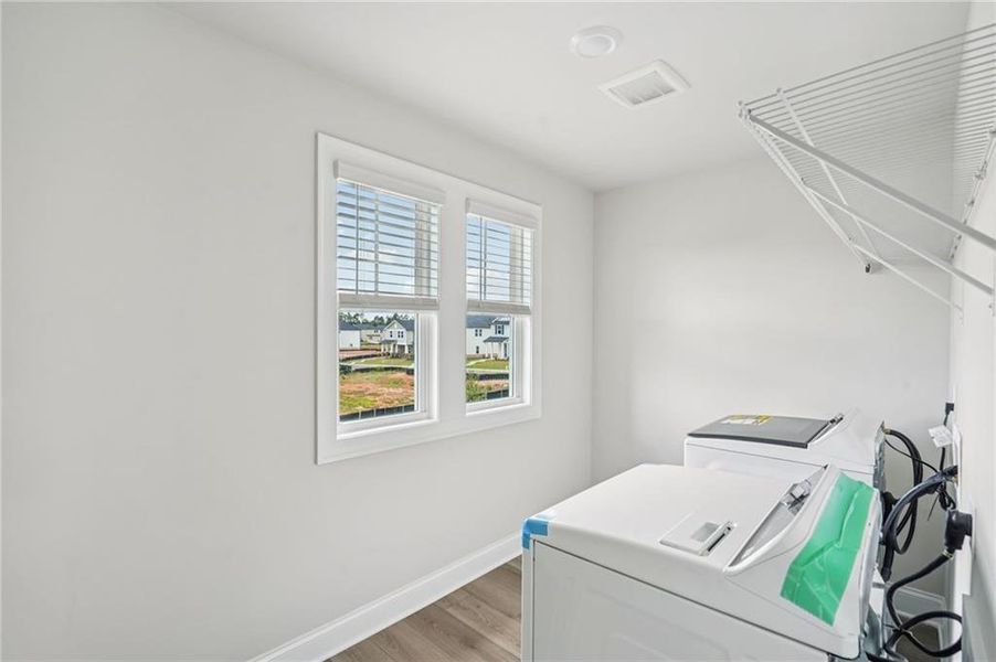 Furnished interior view inside a new home in Martin Springs - Estate Series, Lawrenceville (Image 13).