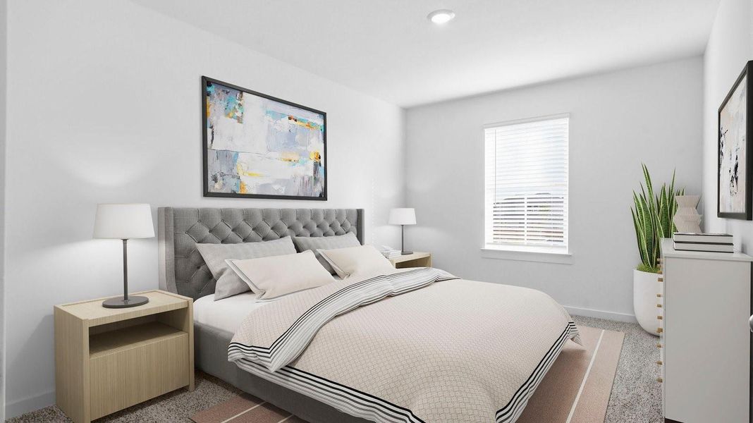 A bedroom with a bright window allowing natural light to enter. A bedroom with a bright window allowing natural light to enter.