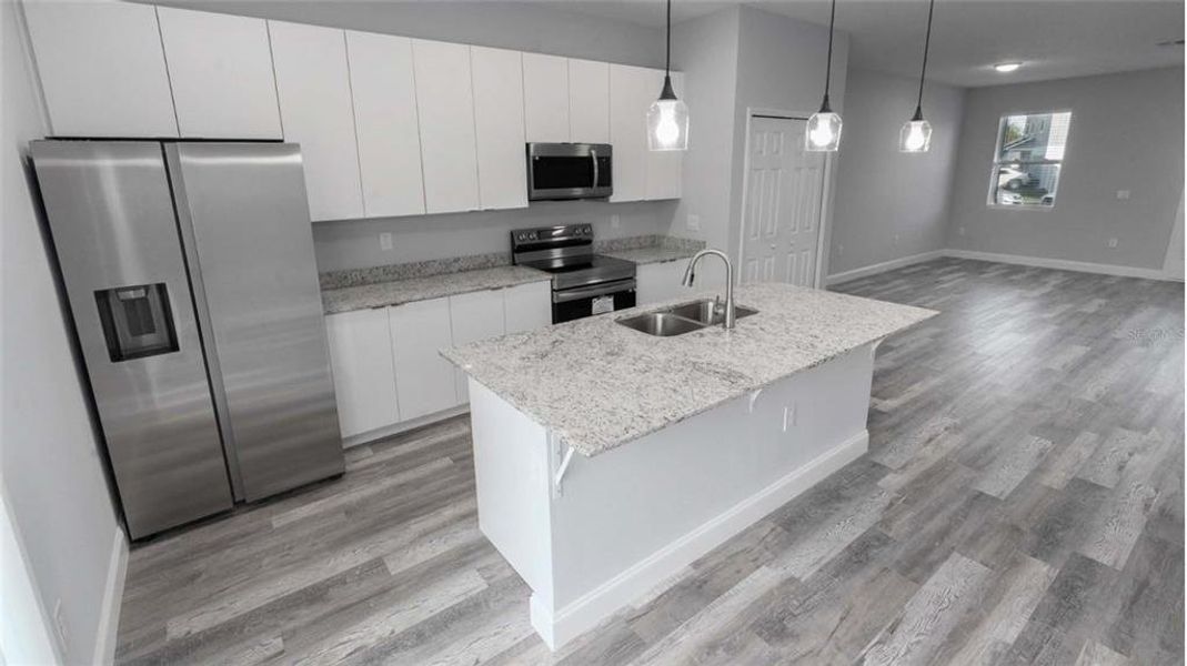 Furnished interior view inside a new home in , Dunnellon (Image 4).