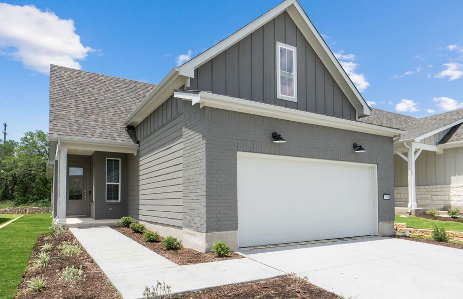 Front exterior of a new home in Sun City Texas, Georgetown, TX, highlighting curb appeal (Image 20). Front exterior of a new home in Sun City Texas, Georgetown, TX, highlighting curb appeal (Image 20).