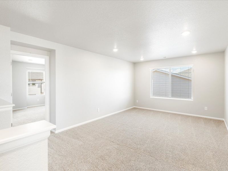 Loft in the Wateron floorplan at a Meritage Homes community in Brighton, CO.