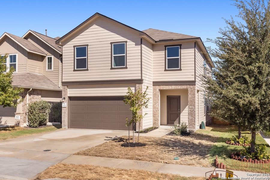 Front exterior of a new home in Knox Ridge, Converse, TX, highlighting curb appeal (Image 10). Front exterior of a new home in Knox Ridge, Converse, TX, highlighting curb appeal (Image 10).