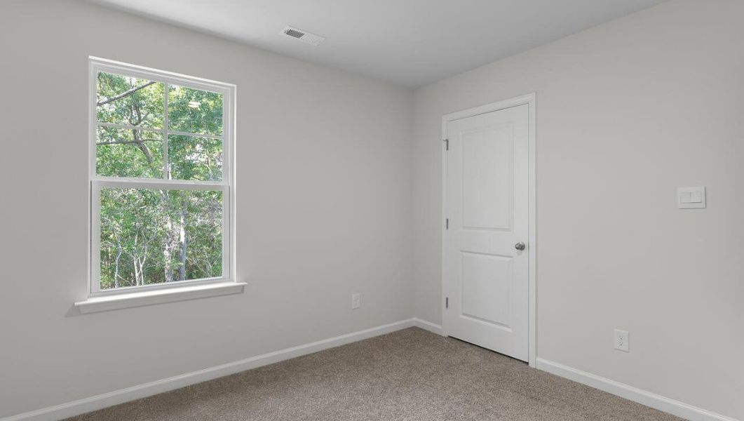 Spacious, unfurnished interior of a new home in The Preserve at Tidewater, Sneads Ferry (Image 34).