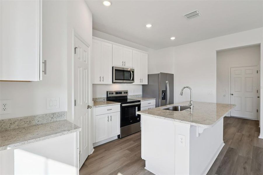 Furnished interior view inside a new home in The Meadow at Crossprairie Bungalows, St. Cloud (Image 6).