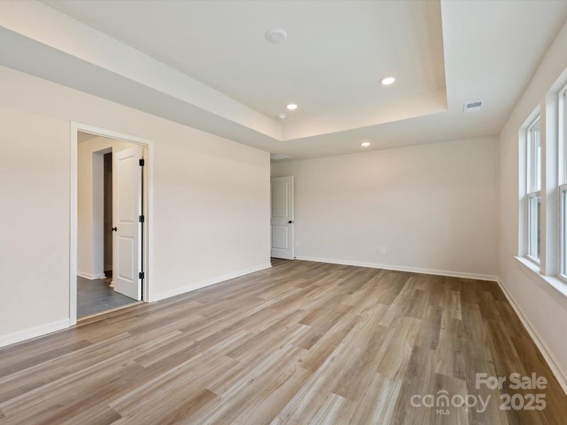 Spacious, unfurnished interior of a new home in North Creek Village - Townhomes, Huntersville (Image 20).