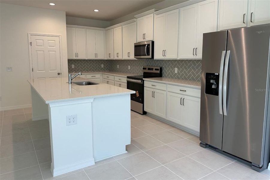 Furnished interior view inside a new home in , Deland (Image 5). Furnished interior view inside a new home in , Deland (Image 5).