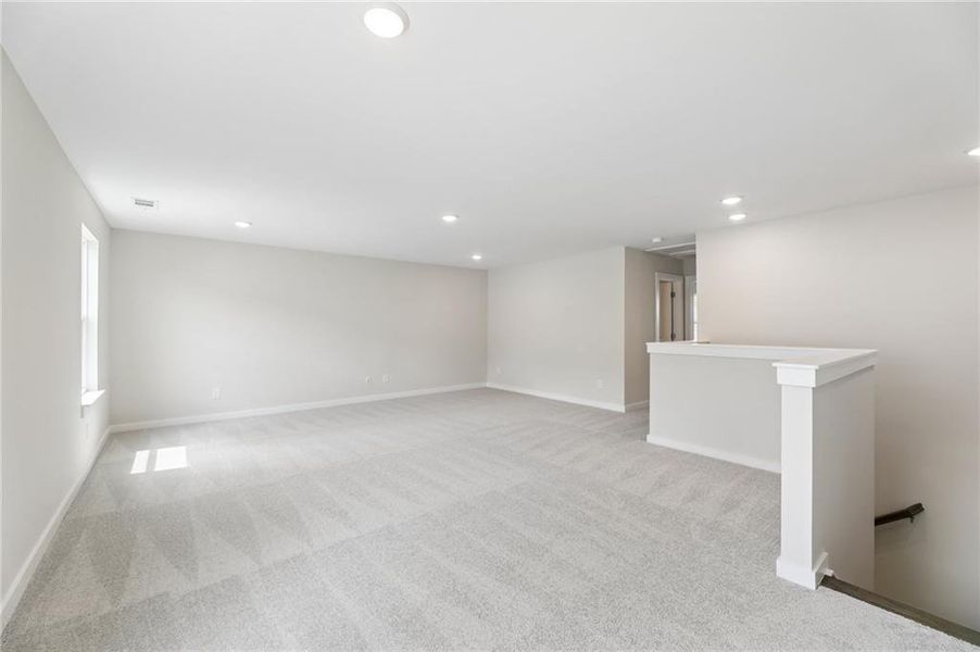 Spacious, unfurnished interior of a new home in The Park at Brighton, Locust Grove (Image 24).