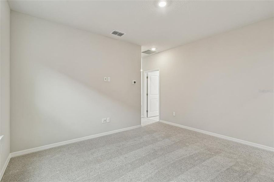 Spacious, unfurnished interior of a new home in Laureate Park at Lake Nona - Garden Series, Orlando (Image 23).