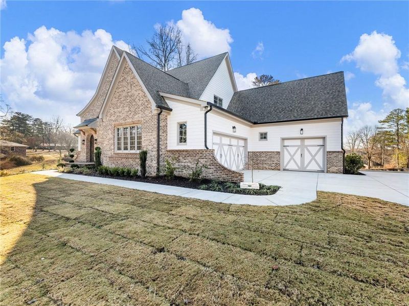 Front exterior of a new home in , Buford, GA, highlighting curb appeal (Image 29).