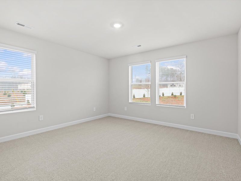 Spacious, unfurnished interior of a new home in Crossing at Abner Creek Townes, Greer (Image 14).