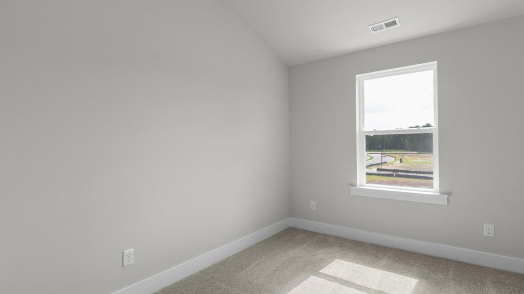 Representative unfurnished interior of a home built from the CARDINAL by D.R. Horton in Indigo Preserve Townhomes, Leland (Image 23).