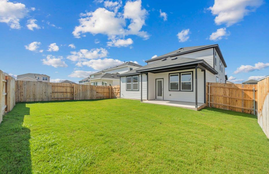 Exterior details and patio area of a home in Sunfield, Buda (Image 3).