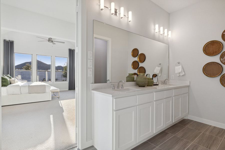 Primary Bathroom in the Monet II home plan by Trophy Signature Homes – REPRESENTATIVE PHOTO