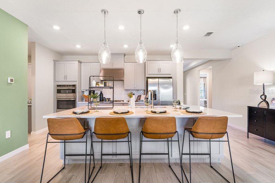 Furnished interior view inside a new home in Coasterra Community Group Page, Palmetto (Image 4).