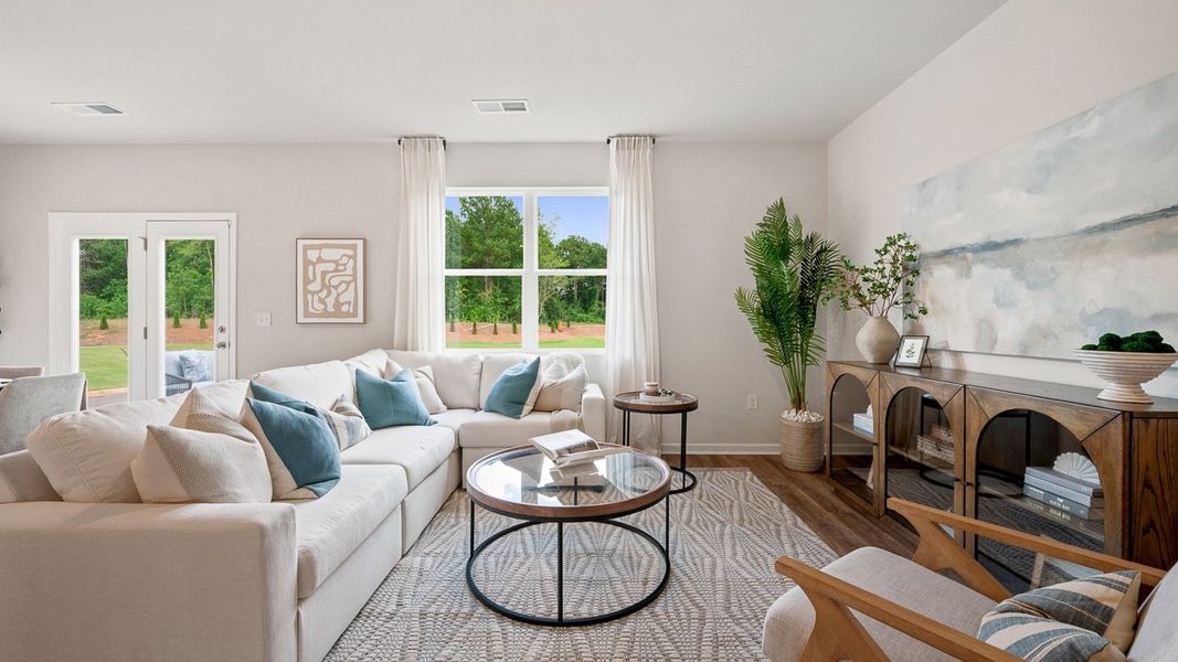 Representative furnished interior of a home built from the HAYDEN Express by D.R. Horton in Teamon Pointe, Griffin (Image 15).