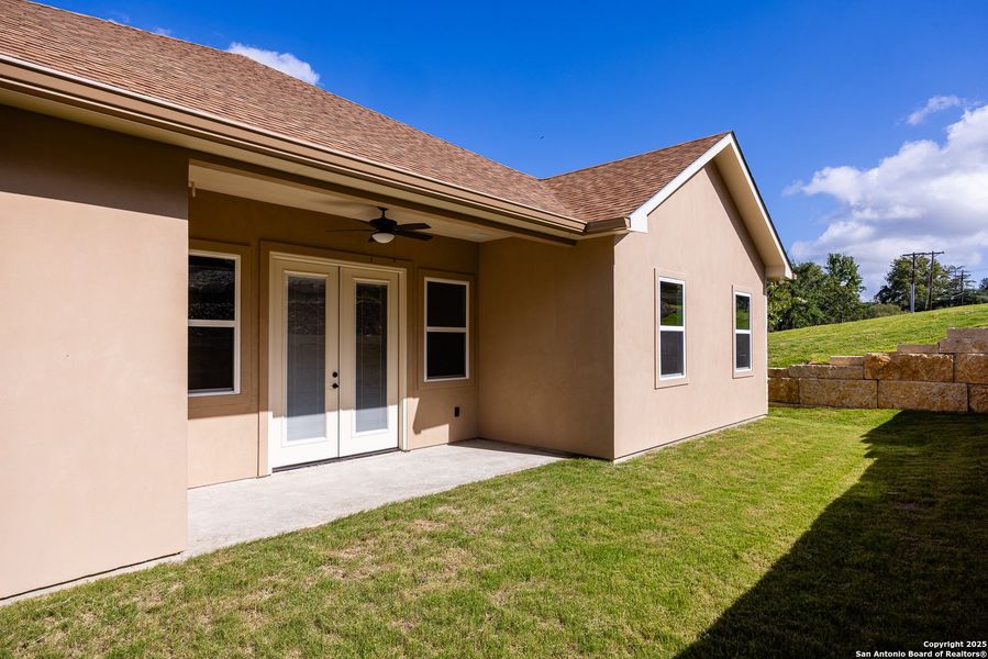Exterior details and patio area of a home in , Kerrville (Image 3).