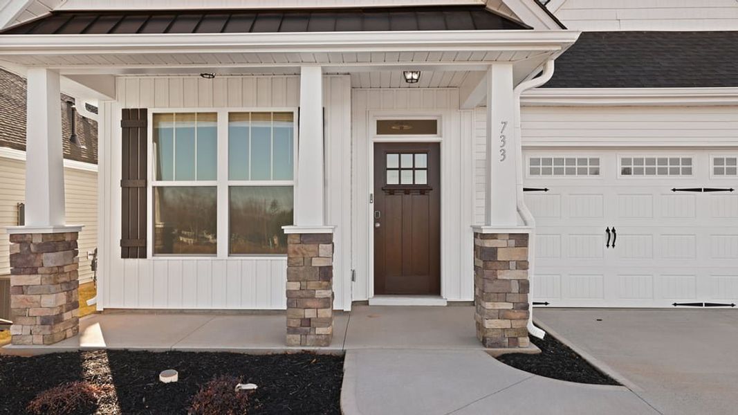 Exterior details and patio area of a home in Village 3, Woodruff (Image 2). Exterior details and patio area of a home in Village 3, Woodruff (Image 2).